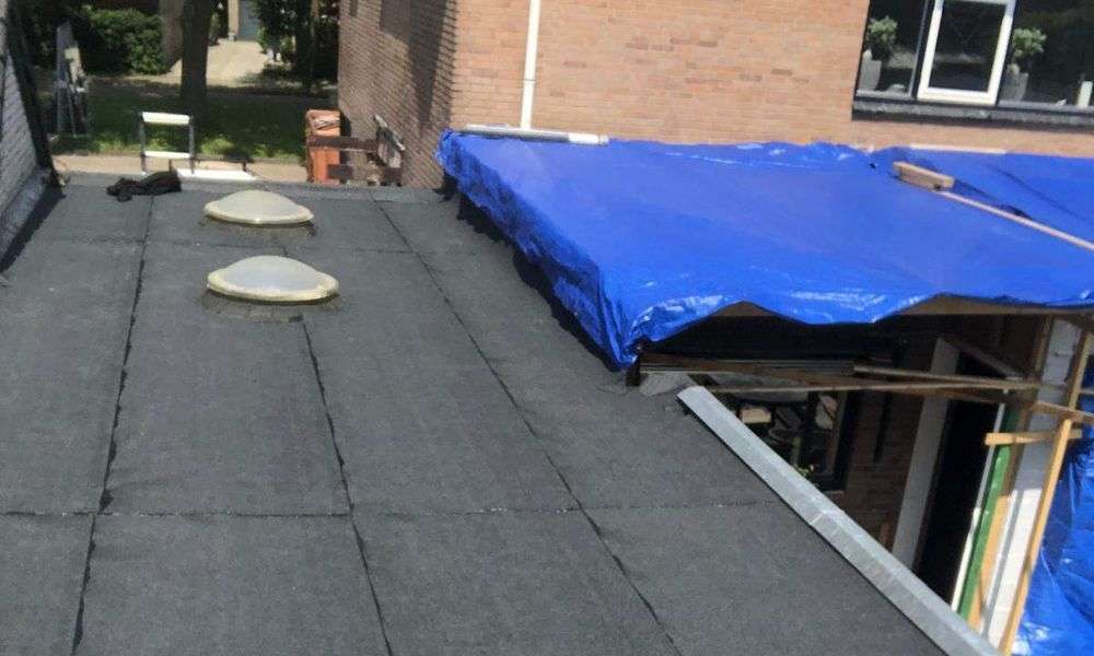 schade aan een plat dak